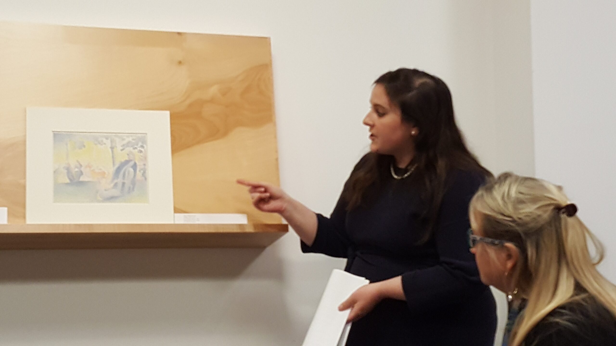 Former student Theresa Cunningham in study of an object from the Palmer's collection