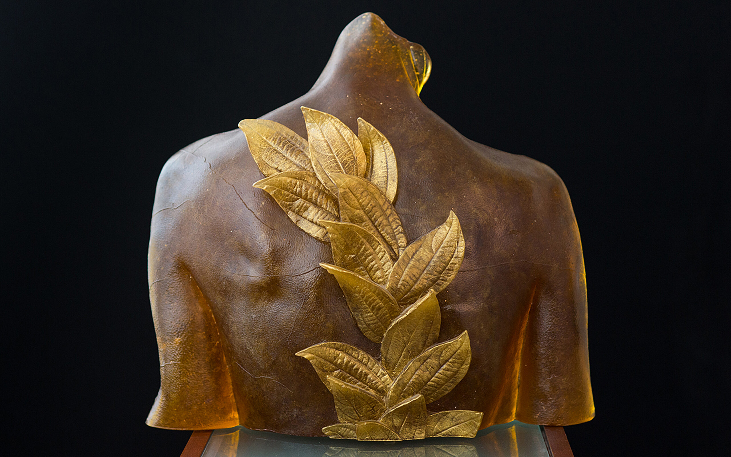 Mary Van Cline (American, b. 1954), Torso with Gold Leaves, 2004, pâte de verre with gold leaf, 13 x 17 x 6 inches. Palmer Museum of Art, Gift of Bette and Arnold Hoffman, 2016.115. © Mary Van Cline