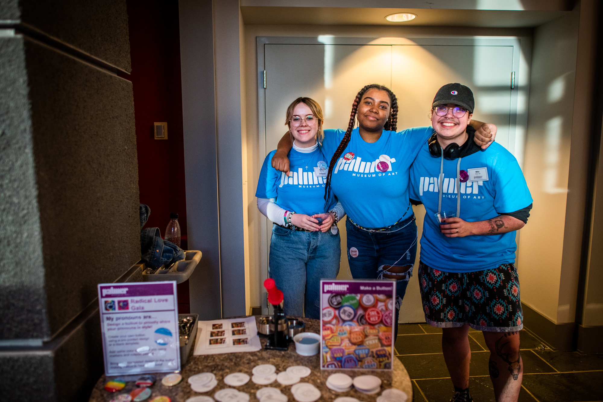 Three Palmer Student Ambassadors pose for a photo during Art After Hours